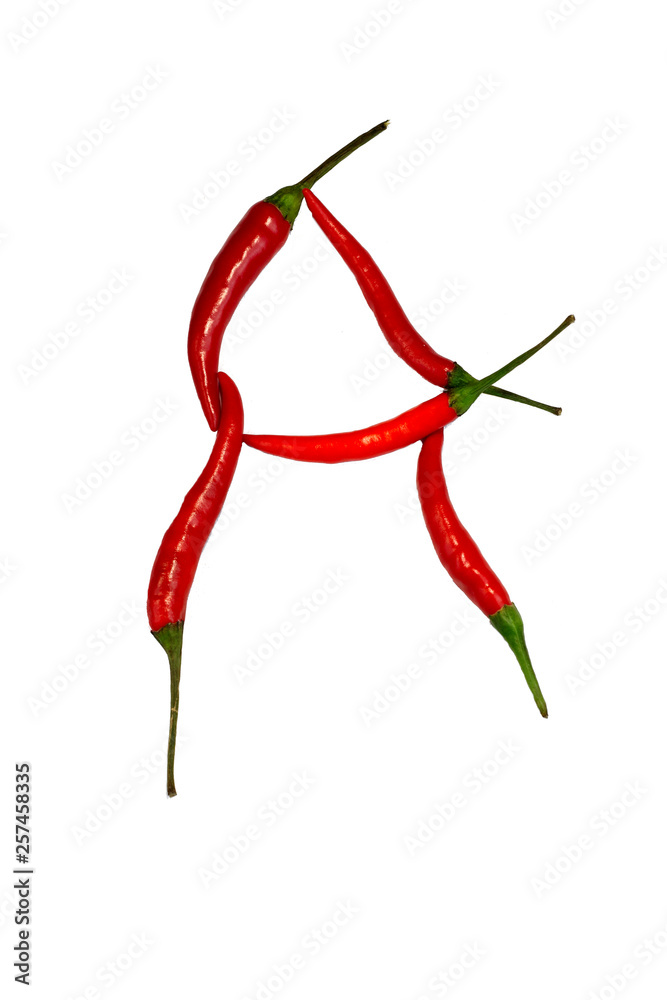 Alphabet of hot spice cayenne chili peppers isolated on white. Natural vegetarian diet organic vegetable chili peppers in shape of letter A, for making words and using as a logo Alphabet of hot spice cayenne chili peppers isolated on white. Natural vegetarian diet organic vegetable chili peppers in shape of letter A, for making words and using as a logo
