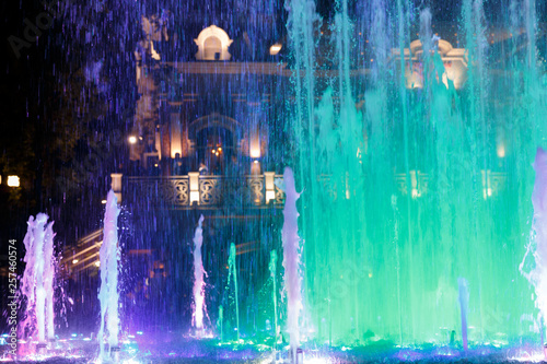 Beautiful, colorful, musical, fountain in the city of Krasnodar on the background of the central avenue