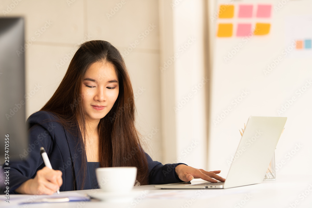 Young business woman with modern office ,nature background Young business woman with modern office ,nature background