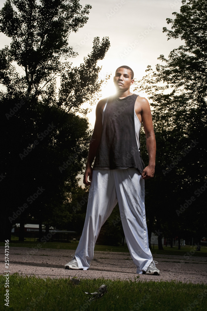 AJ Walker (18 years old) poses for a portrait on the basketball court