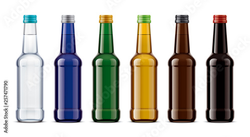 A set of colored glass bottles. 
