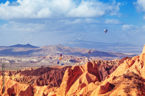 Hot air balloons in the sky over Cappadocia.