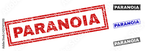 Wallpaper Mural Grunge PARANOIA rectangle stamp seals isolated on a white background. Rectangular seals with grunge texture in red, blue, black and grey colors. Torontodigital.ca