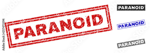 Grunge PARANOID rectangle stamp seals isolated on a white background. Rectangular seals with grunge texture in red, blue, black and gray colors.