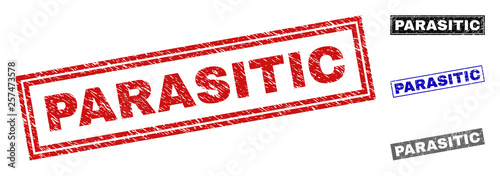Grunge PARASITIC rectangle stamp seals isolated on a white background. Rectangular seals with distress texture in red, blue, black and grey colors.