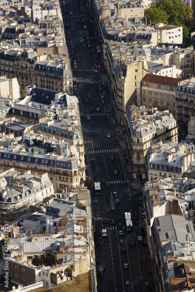 Aerial view of cityscape with vehicles moving on street Aerial view of cityscape with vehicles moving on street