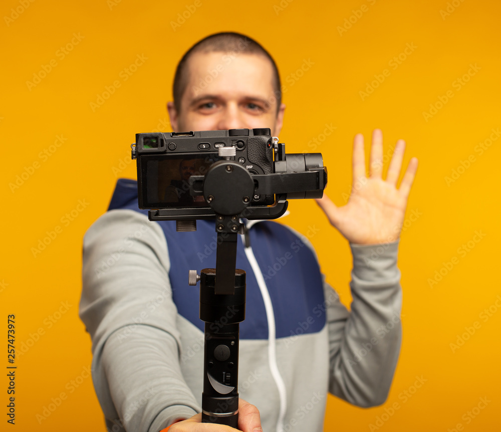 Man video blogger filming video about himself Man video blogger filming video about himself