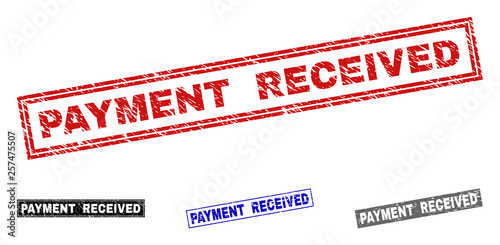 Grunge PAYMENT RECEIVED rectangle stamp seals isolated on a white background. Rectangular seals with grunge texture in red, blue, black and gray colors.
