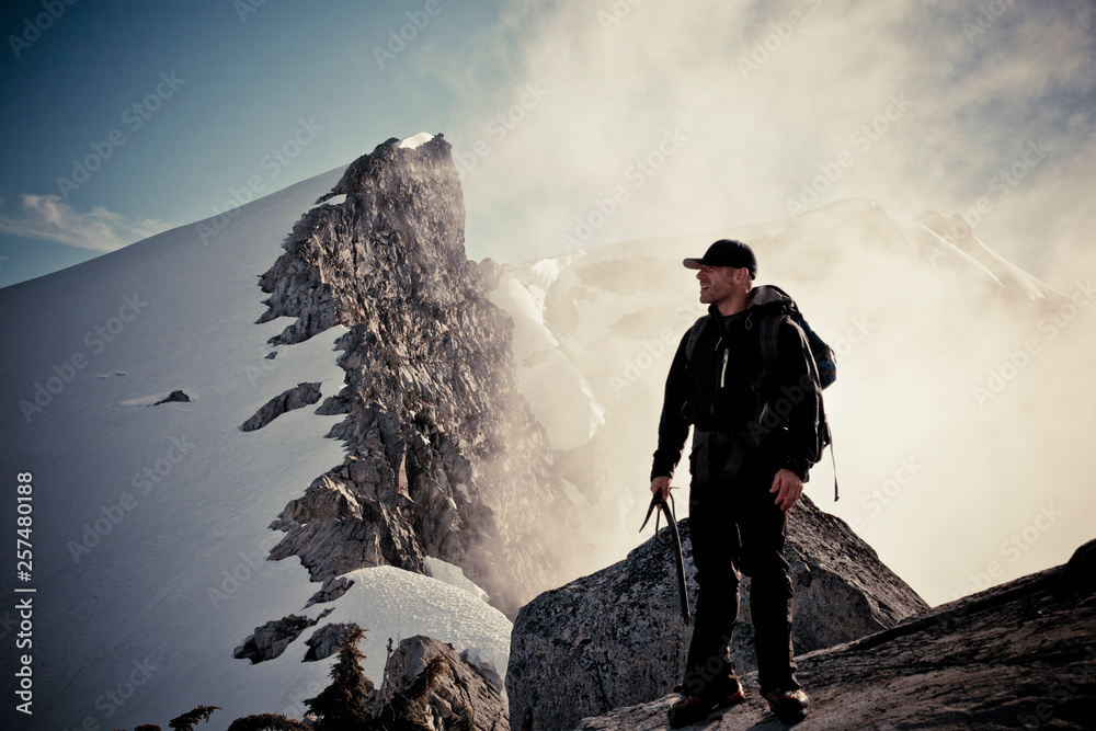 Mountaineer on route toward Grainger Peak, Canada Mountaineer on route toward Grainger Peak, Canada