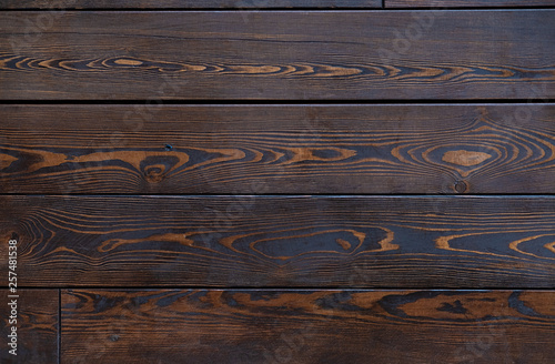 Texture of old brown floor boards with fibers