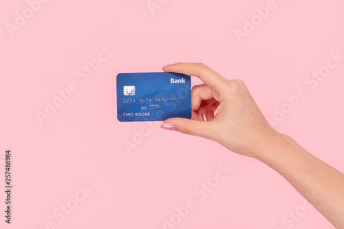 Crop girl with blue credit card 