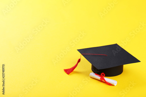 Εκτύπωση καμβά Graduation cap with diploma on yellow background