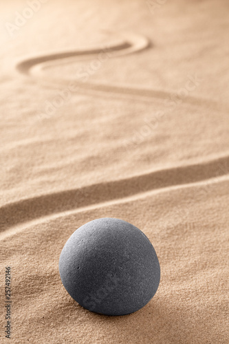 spa wellness and zen, relaxation and meditation concept for purity calmness peaceful harmony simplicity relax sand and stone texture background with lines and copyspace