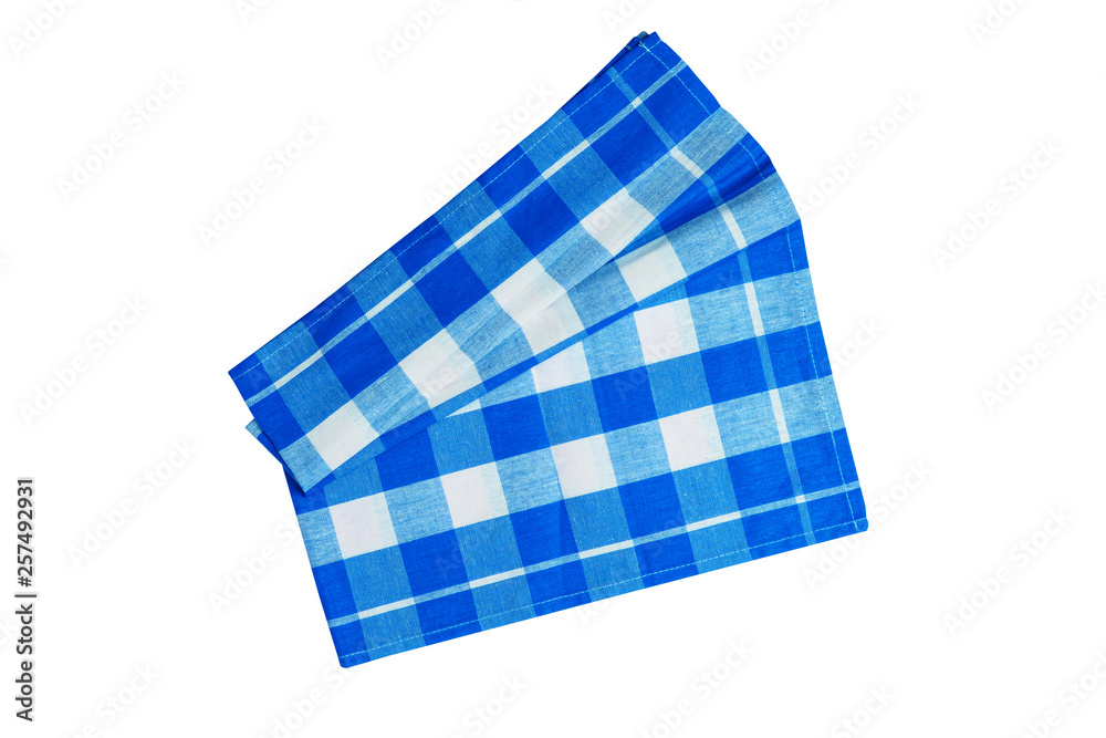 Closeup of a blue and white checkered napkin or tablecloth isolated on white background. Kitchen accessories.