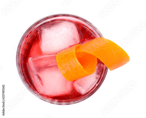 Fototapeta Glass of tasty refreshing cocktail on white background, top view