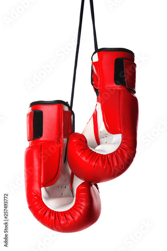 Pair of boxing gloves on white background © New Africa