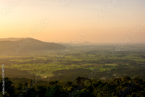 scenery during sunrise time with mountain and savannah field