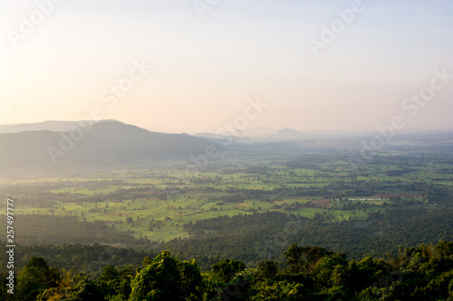 scenery during sunrise time with mountain and savannah field © sihasakprachum