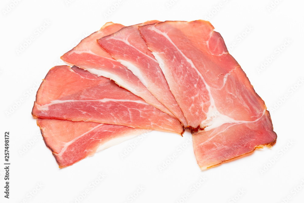 Hamon sliced on white background. Spanisch traditional meat. Hamon sliced on white background. Spanisch traditional meat.
