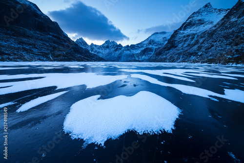 Landscape with frozen Lovatnet lake, Norway photo