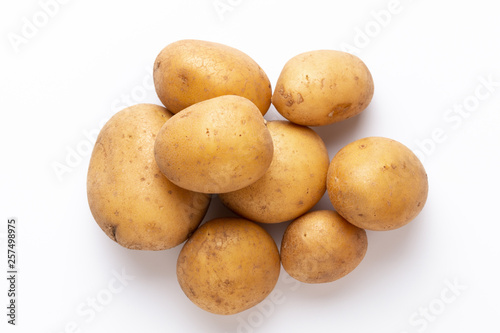 Potatoes isolated on white background. Flat lay. Top view.