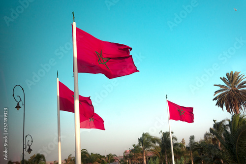 morocco flags on blue sky background photo