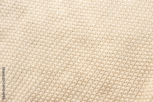 Beige crocheted fabric texture