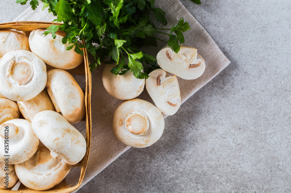 Basket of organic champignon on the table. Basket of organic champignon on the table.