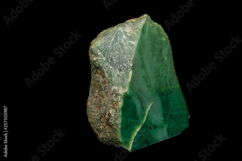 Macro stone Nephrite mineral on black background photo