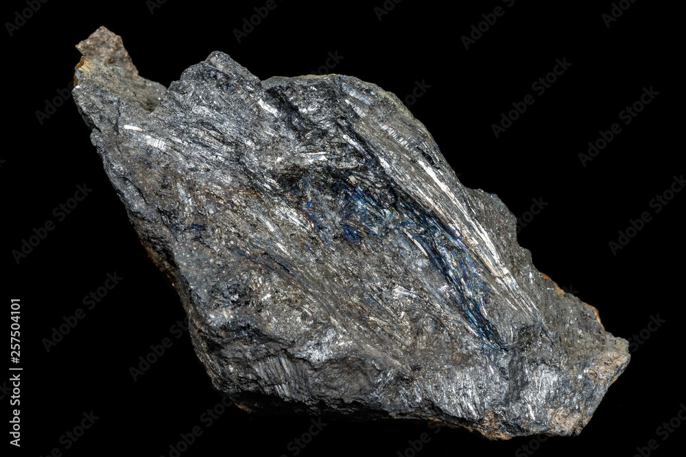 Macro of a stone Stibnite mineral on a black background Macro of a stone Stibnite mineral on a black background