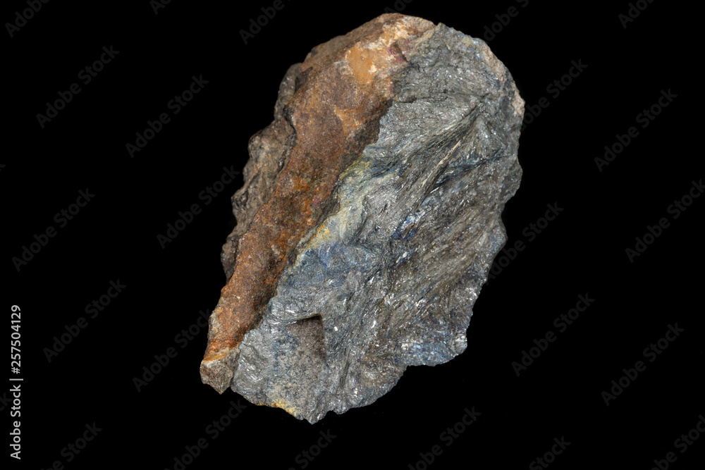 Macro of a stone Stibnite mineral on a black background Macro of a stone Stibnite mineral on a black background