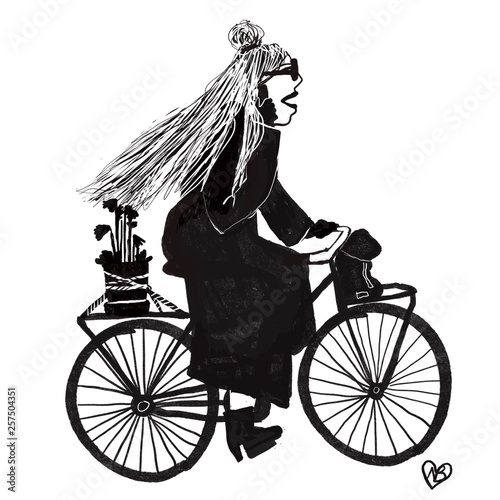 silhouette of girl riding bicycle