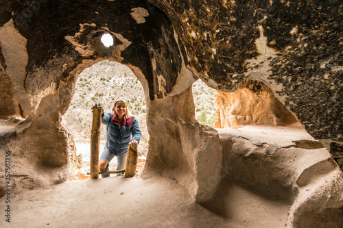Woman visiting Bandelier National Monument, White Rock, New Mexico, USA photo