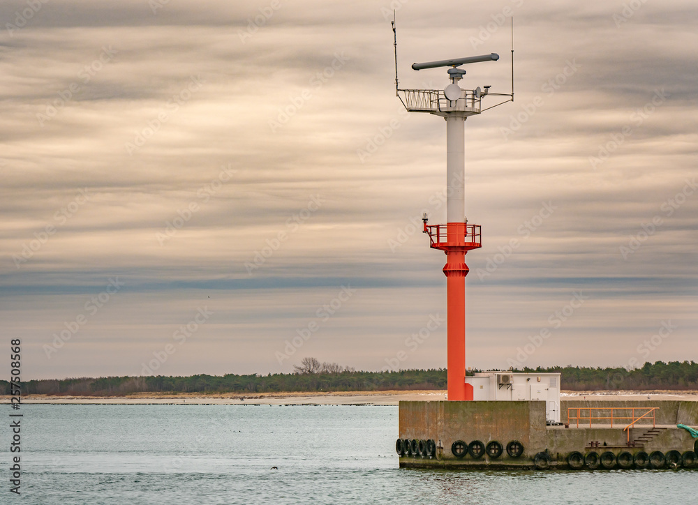 Radar mast at the entrance to the harbour