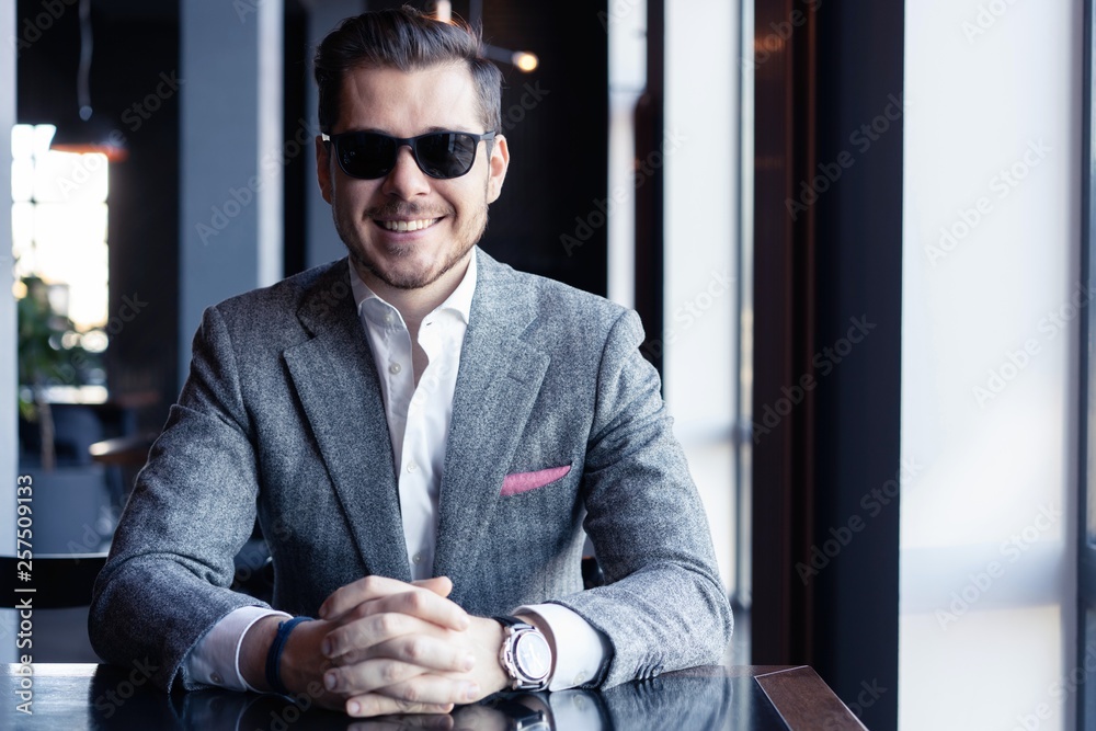 Business man drinking coffee in a cafe - coffee time. Business man drinking coffee in a cafe - coffee time.
