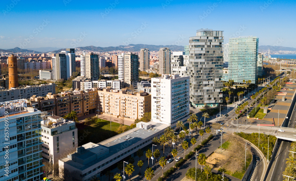 Fototapeta premium Barcelona, Spain - March 05, 2019: Modern high-rise buildings in the coastal residential areas of Diagonal Mar and Poblenou