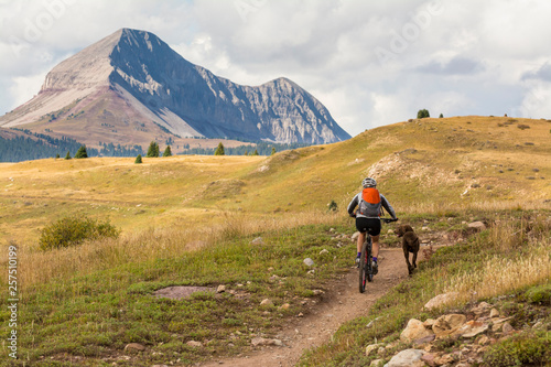 A woman  mountain biking in the San Juan National Forest, Silverton, Colorado.
