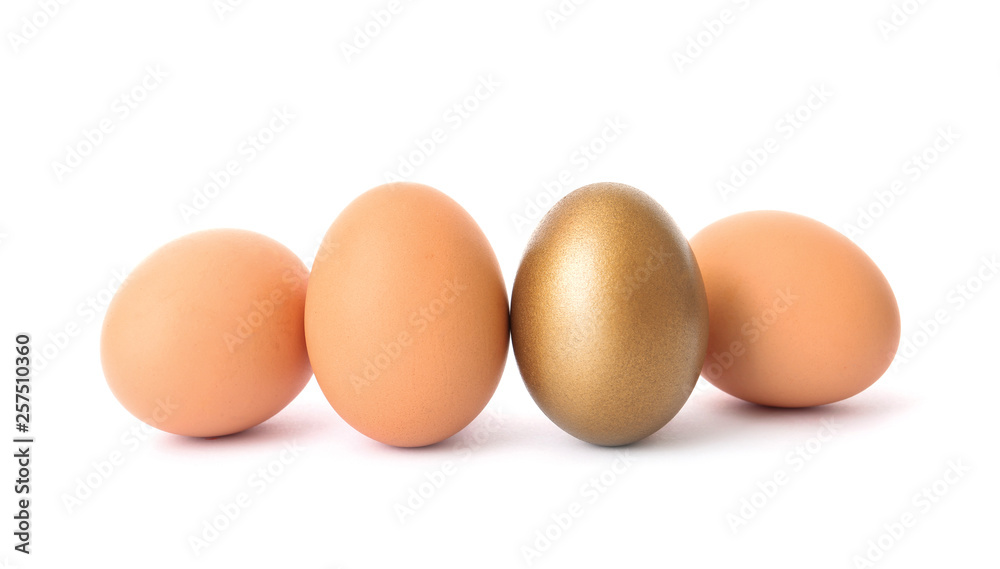 Golden egg among others on white background Golden egg among others on white background