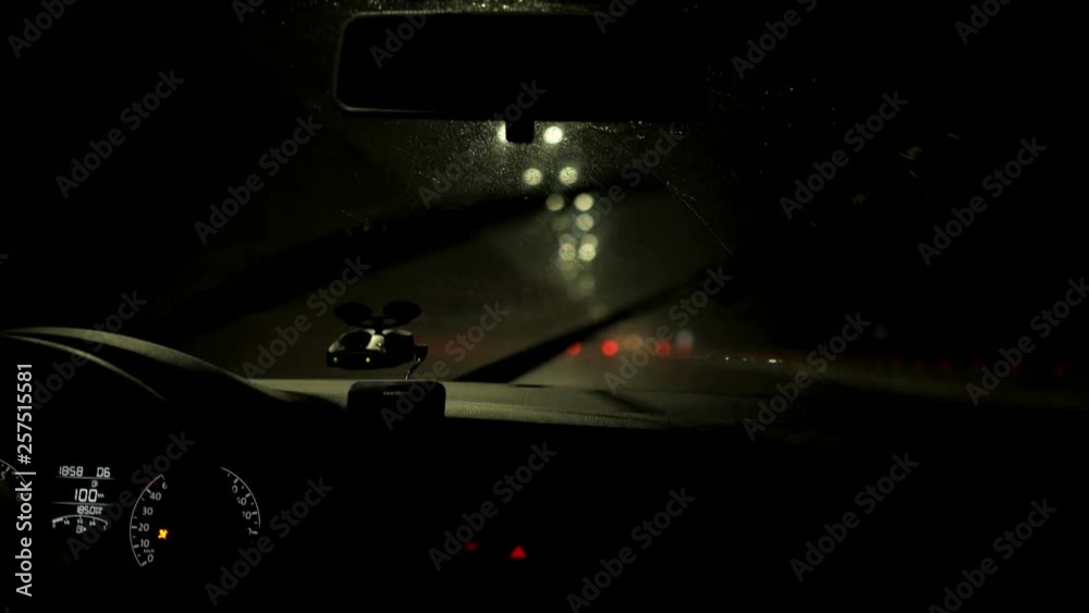 The windshield wipers of cars running fast in heavy rain The windshield wipers of cars running fast in heavy rain
