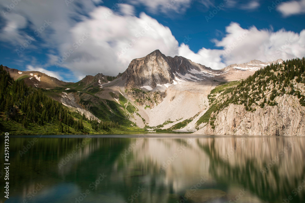 Snowmass Mountain reflecting in Snowmass Lake, Aspen, Colorado, USA Snowmass Mountain reflecting in Snowmass Lake, Aspen, Colorado, USA