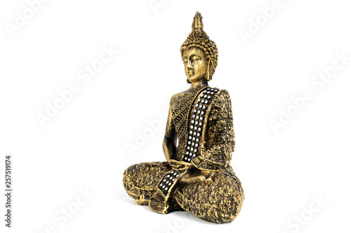 Buddha sculpture with golden color and vintage overall look isolated on white background with right view