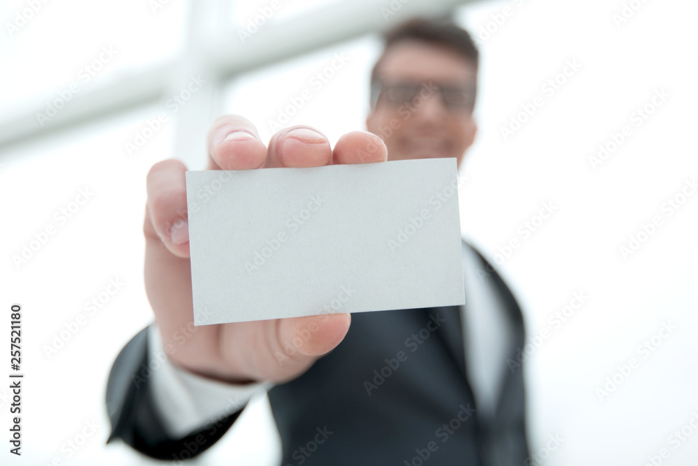 businessman showing a blank business card businessman showing a blank business card