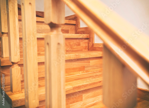 Contemporary brown wooden stairs in the house