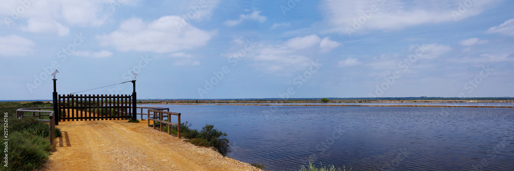 Landscape of the Las Marismas Del Odiel - the natural area where wild flamingos flock occur for whole year, Andalucia, Spain