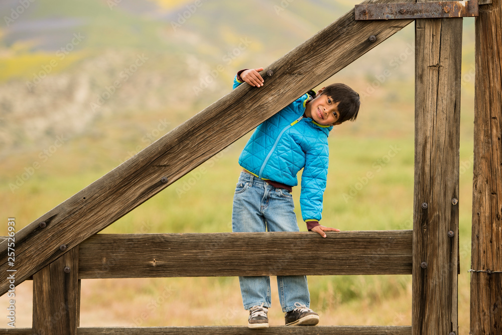 Asian boy at Carrizo Plain National Monument in spring Asian boy at Carrizo Plain National Monument in spring