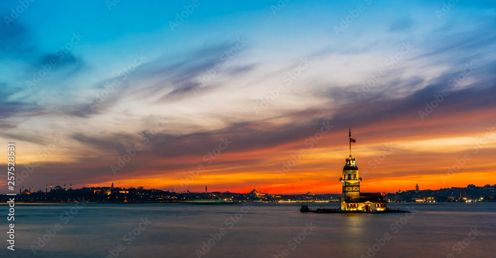 Maiden's Tower with colored sunset sky in Istanbul, Turkey (KIZ KULESI - USKUDAR).