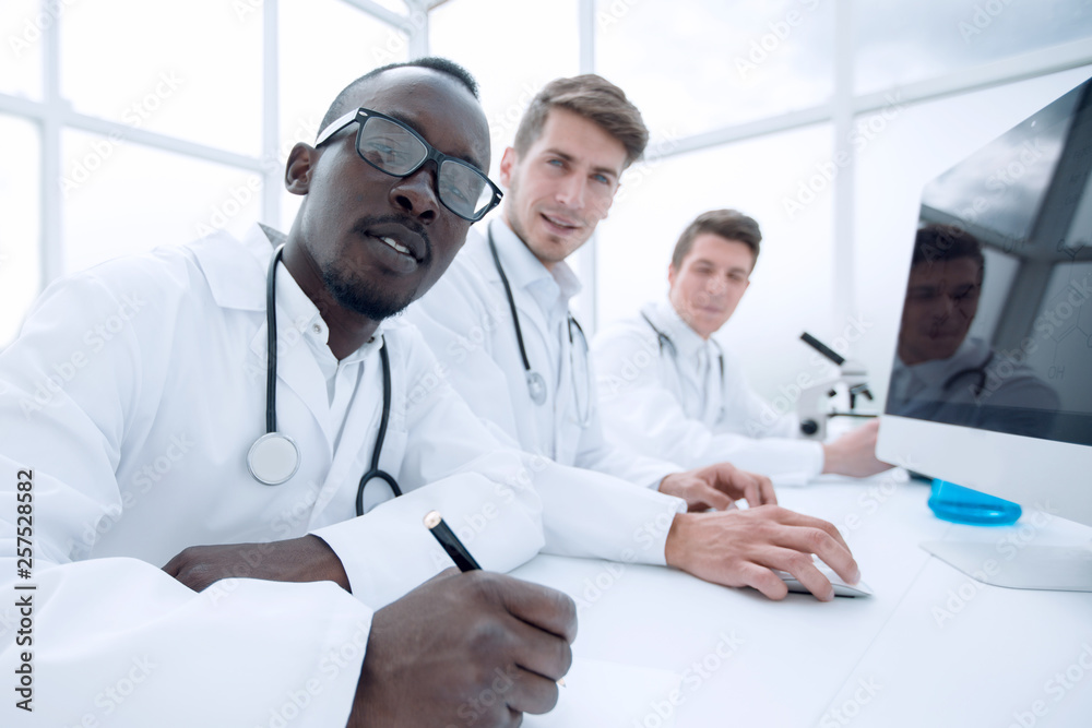group of scientist working in modern lab group of scientist working in modern lab