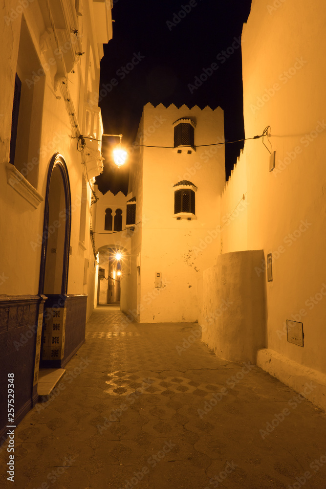 Illuminated Night streets of Asilah Medina, on Atlantic Coast in Morocco