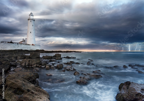 Lighthouse in a storm © conceptualmotion