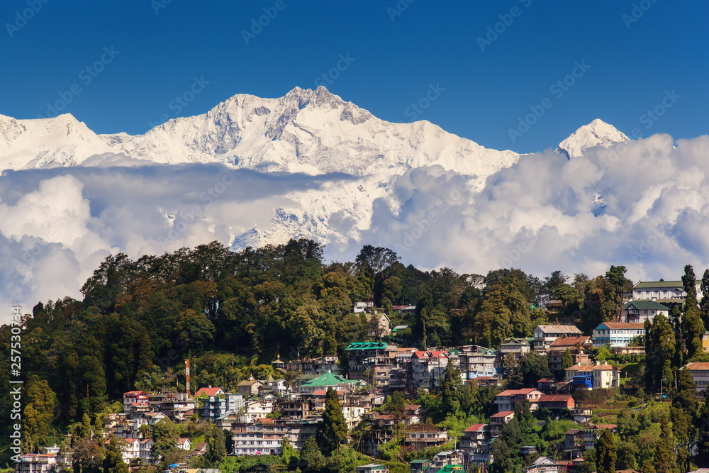 Darjeeling and Kangchenjunga on the background. Kanchenjunga, is the third highest mountain in the world. Beautiful Himalayan landscape near Nepal and Sikkim. Indian Himalayas.